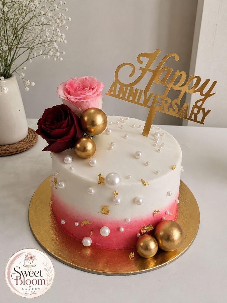 Pink ombre anniversary cake with pearls and fresh roses — Asansol