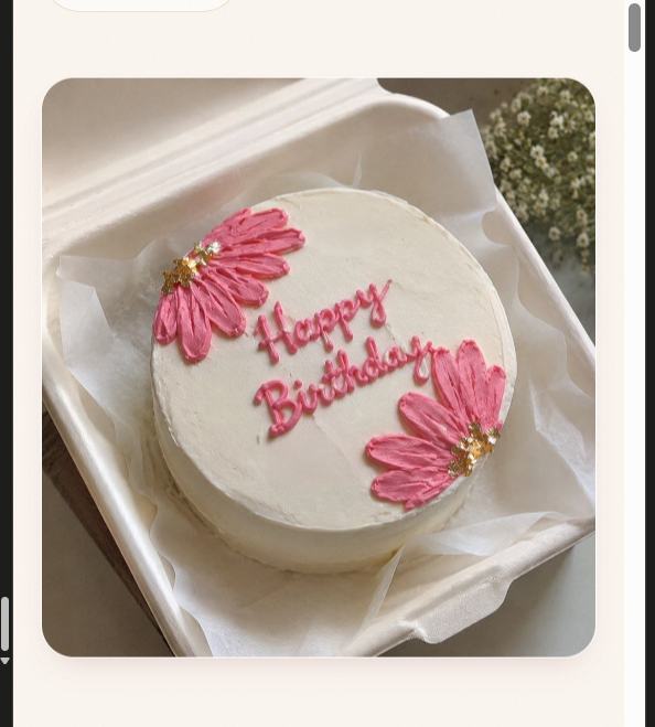 White bento birthday cake with hand-piped pink daisy petals — Asansol